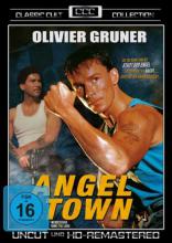 (Angel Town-Stadt des Terrors) In Angel Town, einem Stadtteil von Los Angeles, ist man nach einem Einbruch der Dunkelheit seines Lebens nicht mehr sicher. Sogar die Polizei ist gegen die brutalen Strassenbanden machtlos. Gangsterboss ANGEL terrorisiert das ganze Viertel und wer sich weigert, seiner Gang beizutreten, bezahlt mit dem Leben. Angel hat es besonders auf den jungen MARTIN abgesehen, dessen Vater er auch schon auf dem Gewissen hat. Erst ein Fremder, der Franzose JACQUES, ein Kockbox-Champion, nimmt die Konfrontation mit Angel auf. Als seine Versuche, Martin und seine Familie zu schützen, erfolglos sind, kommt es zum offenen Kampf zwischen Jaques und Angels Gang. Bürgerkriegsähnliche, brutale Straßenschlachten erschüttern Angel Town… Artikelbild